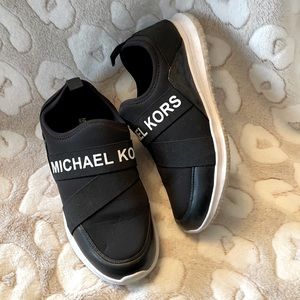 Black Michael Kor sneakers.